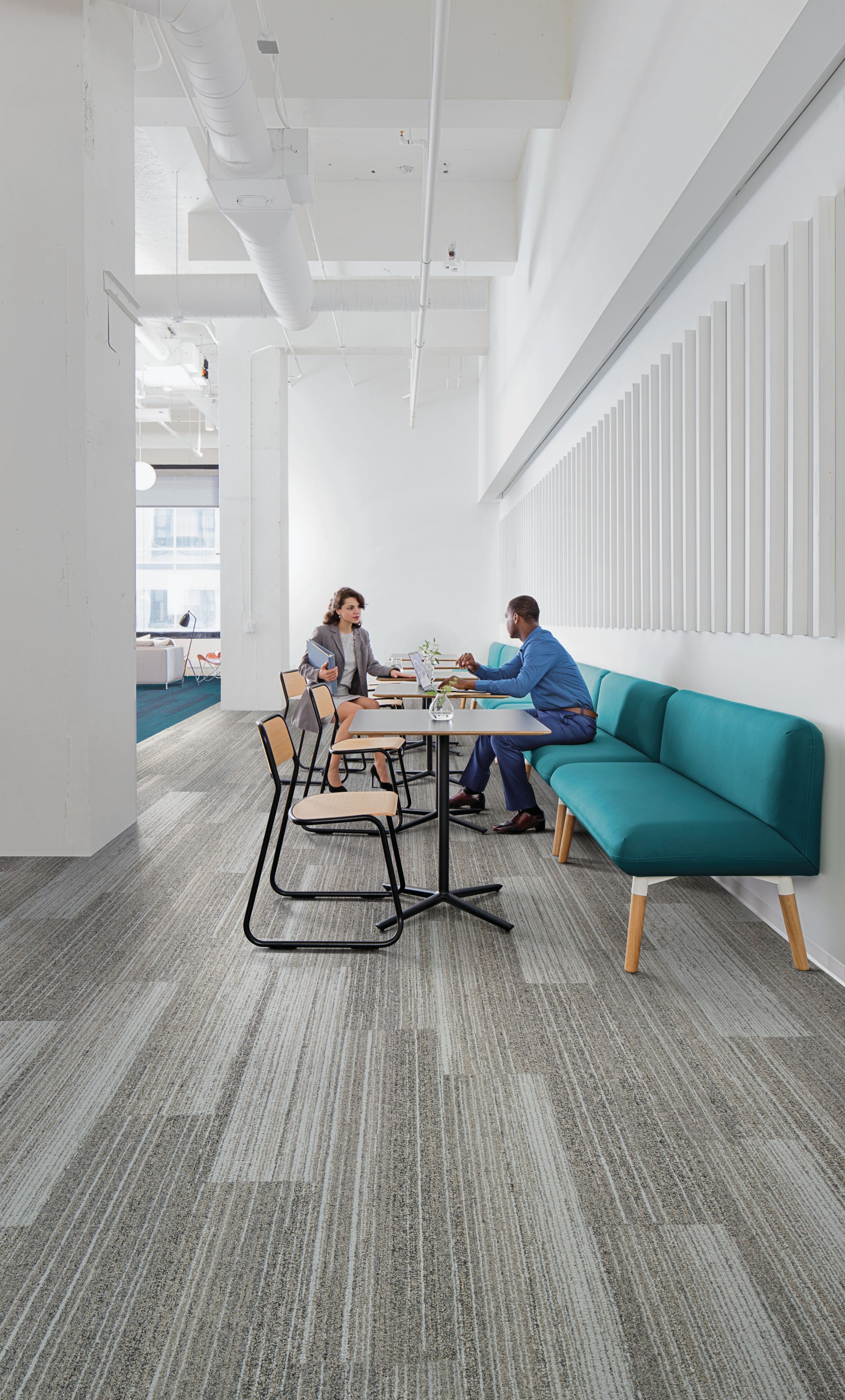 Interface Walk the Plank plank carpet tile in seating area with man and woman  imagen número 8